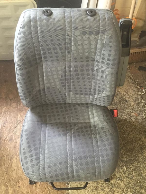 CSG Trimmimg Ford Transit chair recover with OEM fabric